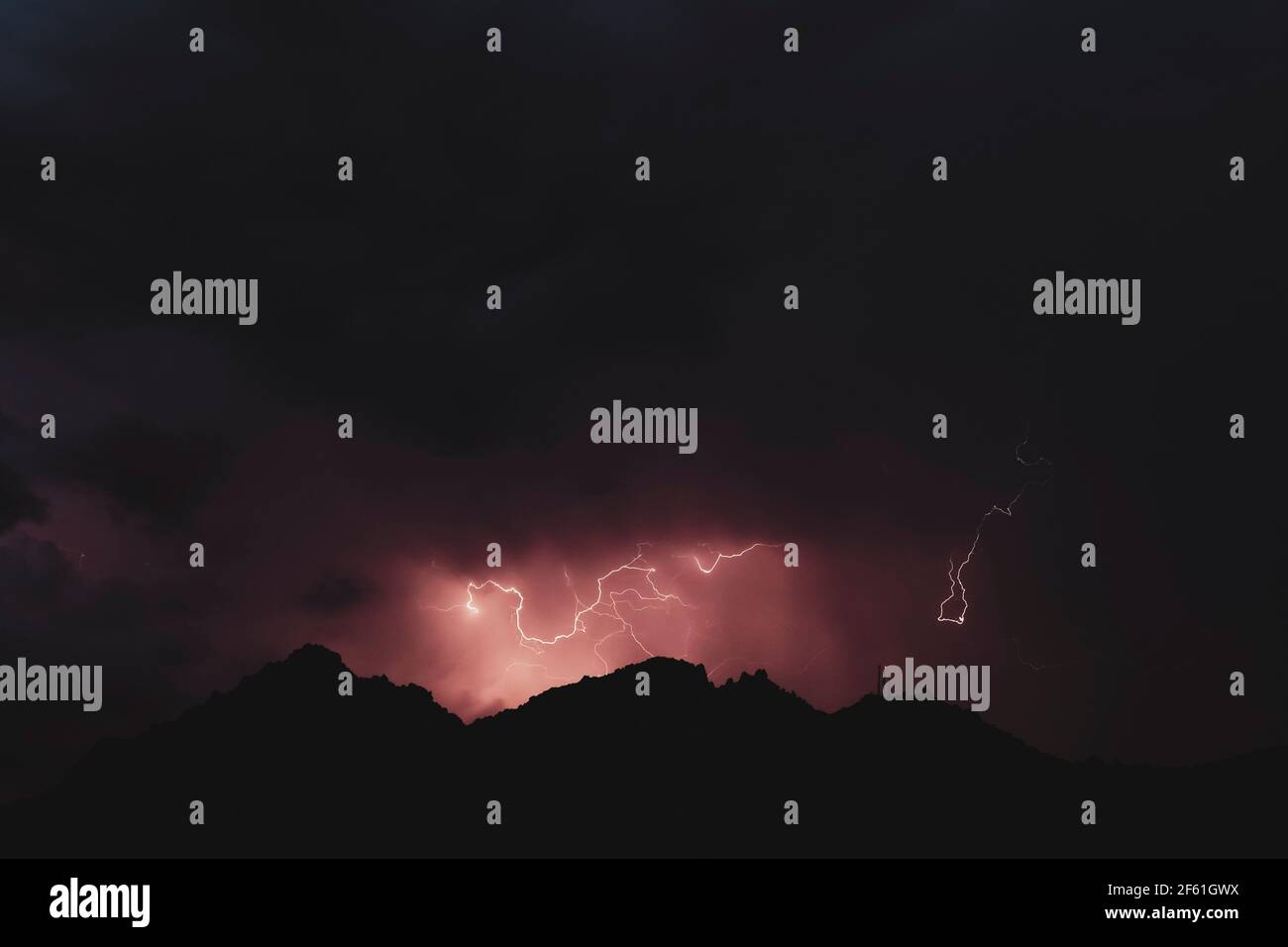 Thunderstorm in a mountain at night. Stock Photo