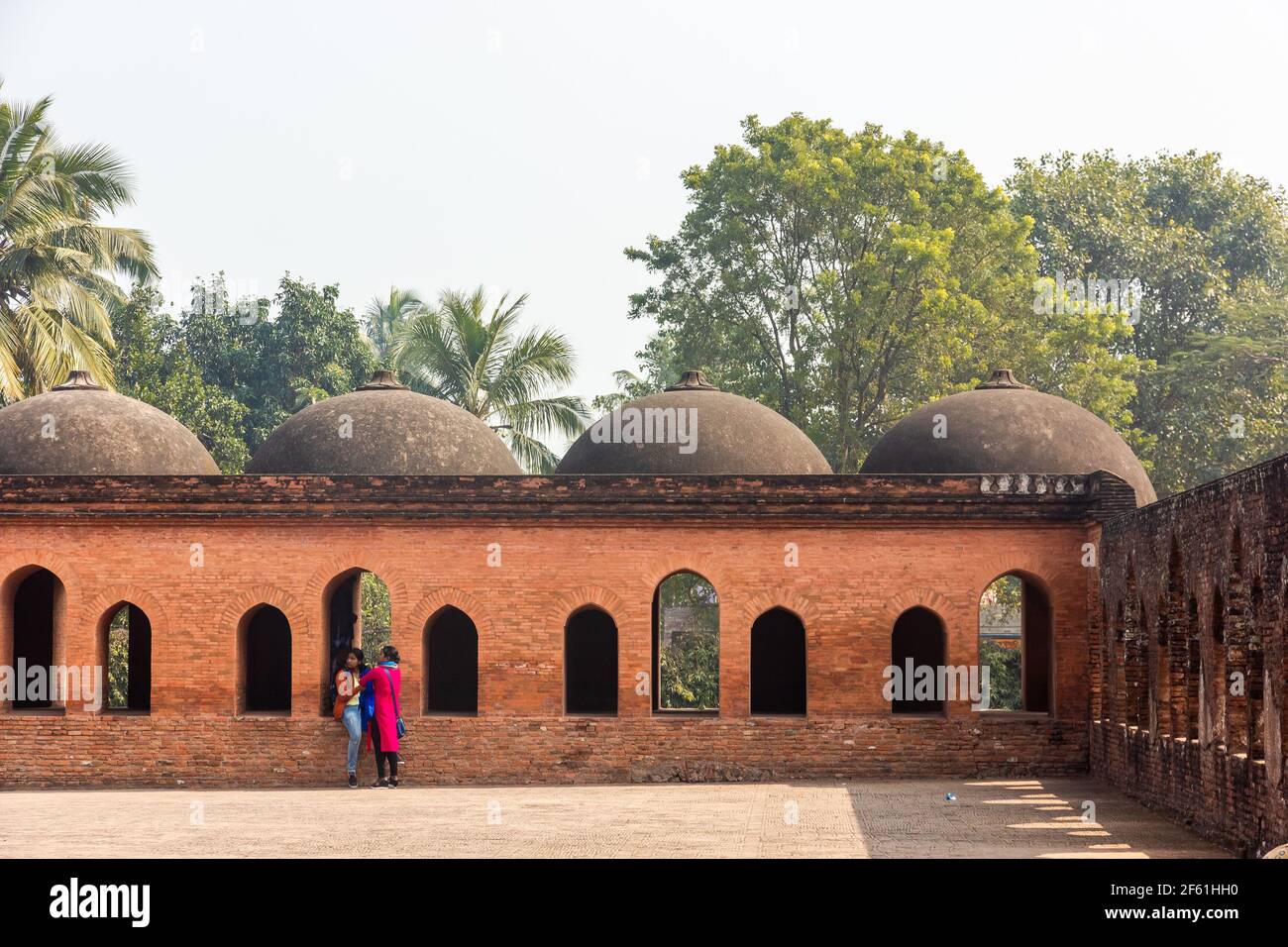 Murshidabad, West Bengal, India - January 2018: A domed  arcade in the ruins of the ancient Katra Masjid mosque in the town of Murshidabad. Stock Photo