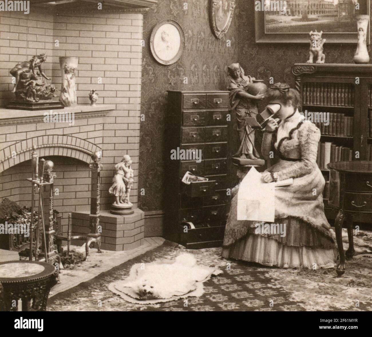 Woman Viewing Stereographs, 1901 Stock Photo