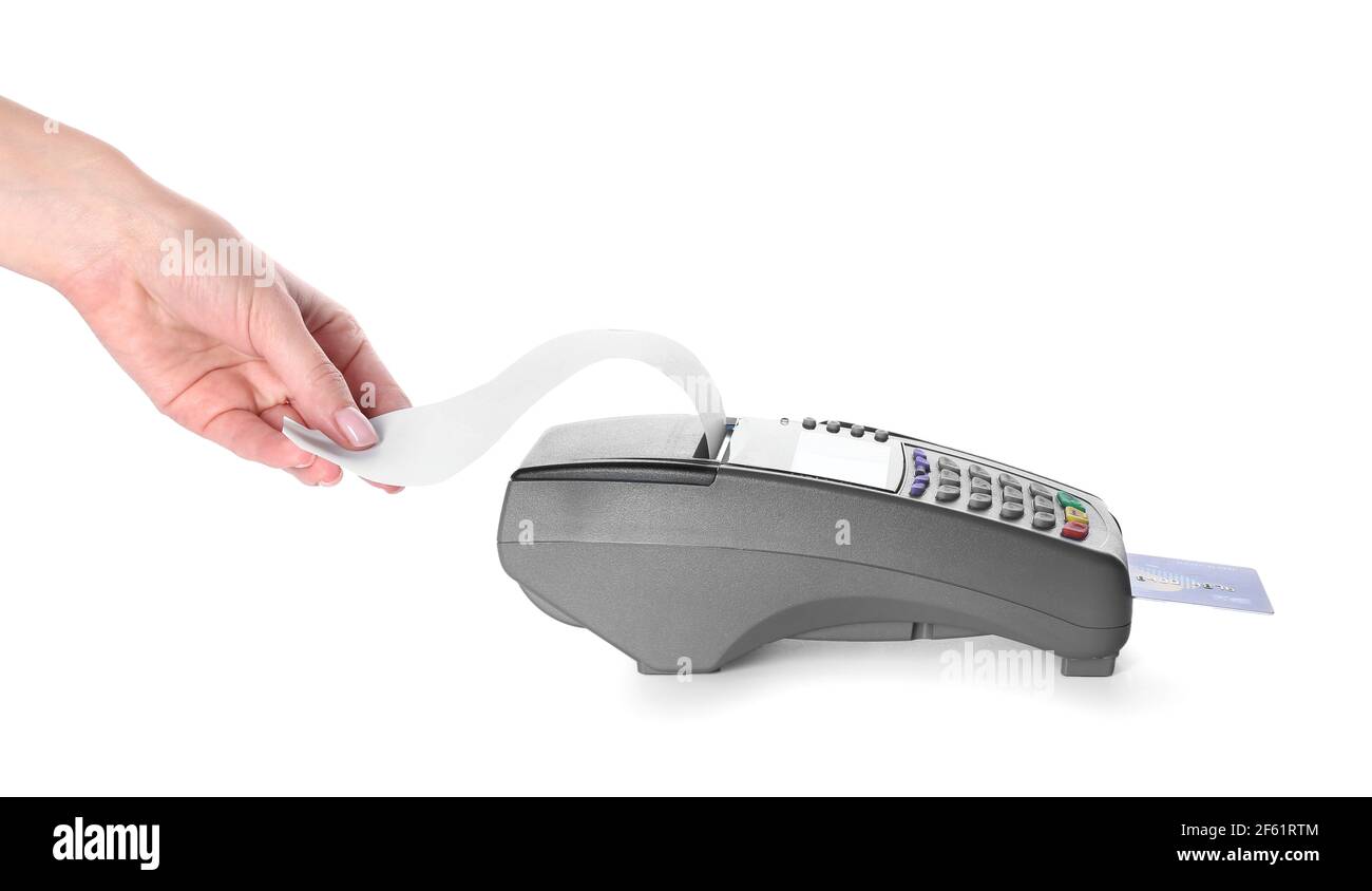 Female hand with payment terminal and credit card on white background ...