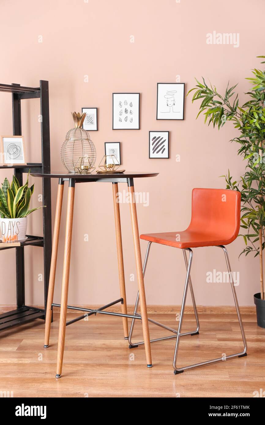 Stylish interior of living room with beautiful pictures Stock Photo - Alamy