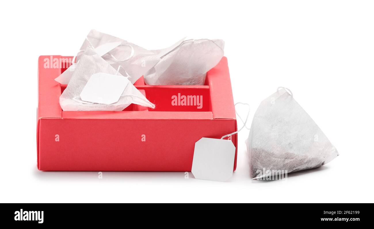Box with tea bags on white background Stock Photo