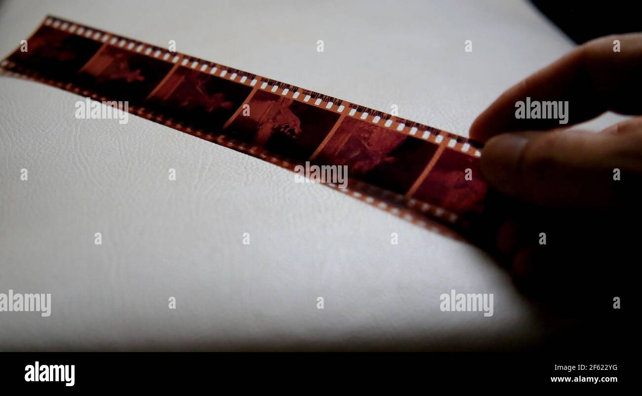 salvador, bahia / brazil - may 14, 2020: negative photography film held by hand. *** Local Caption *** . Stock Photo