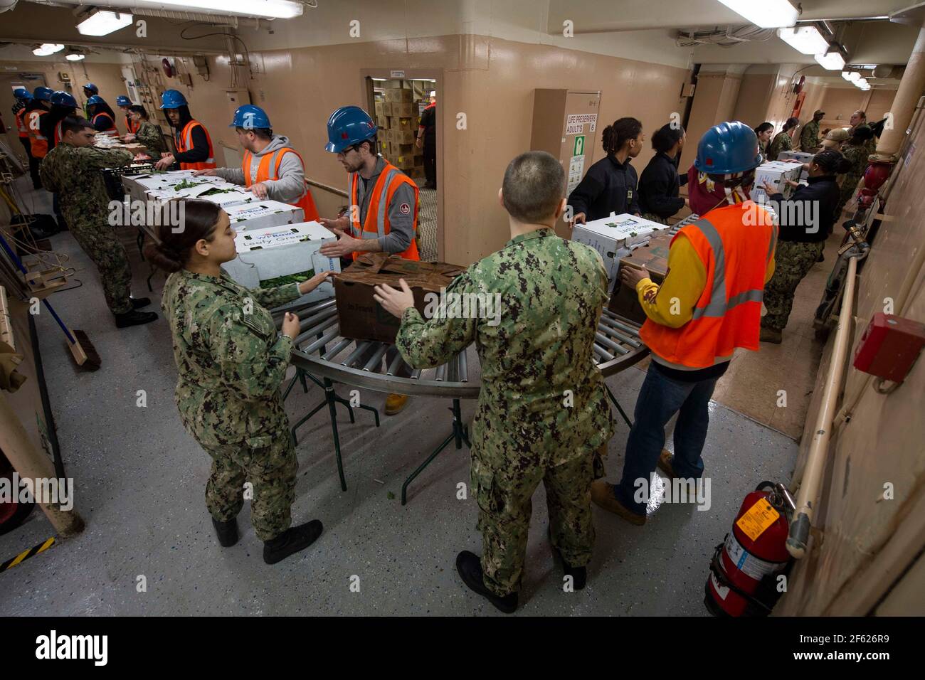 USNS Comfort  Personnel Load Supplies Stock Photo