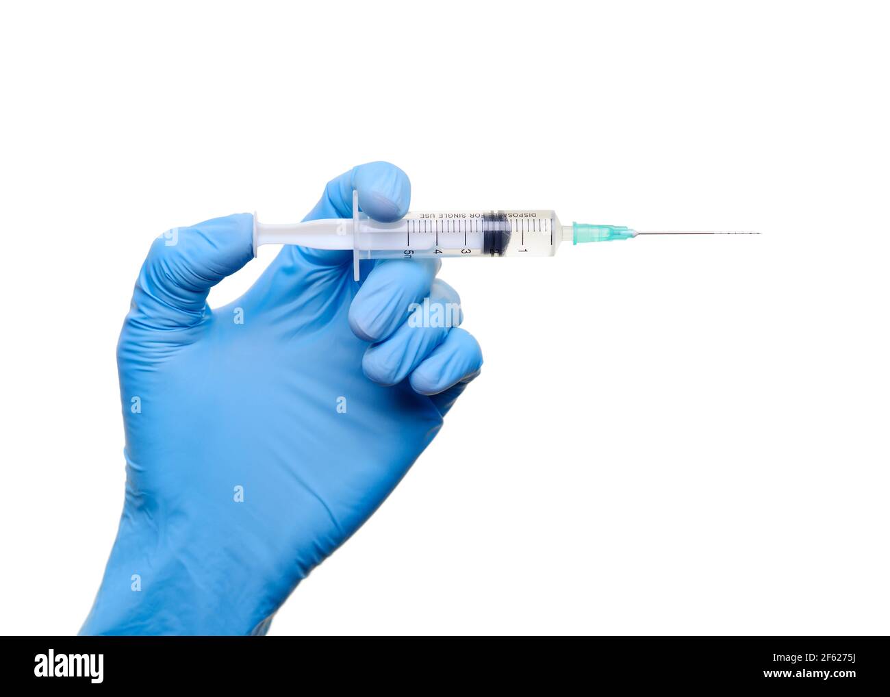 Hand Holding a Syringe Ready for an Injection Stock Photo
