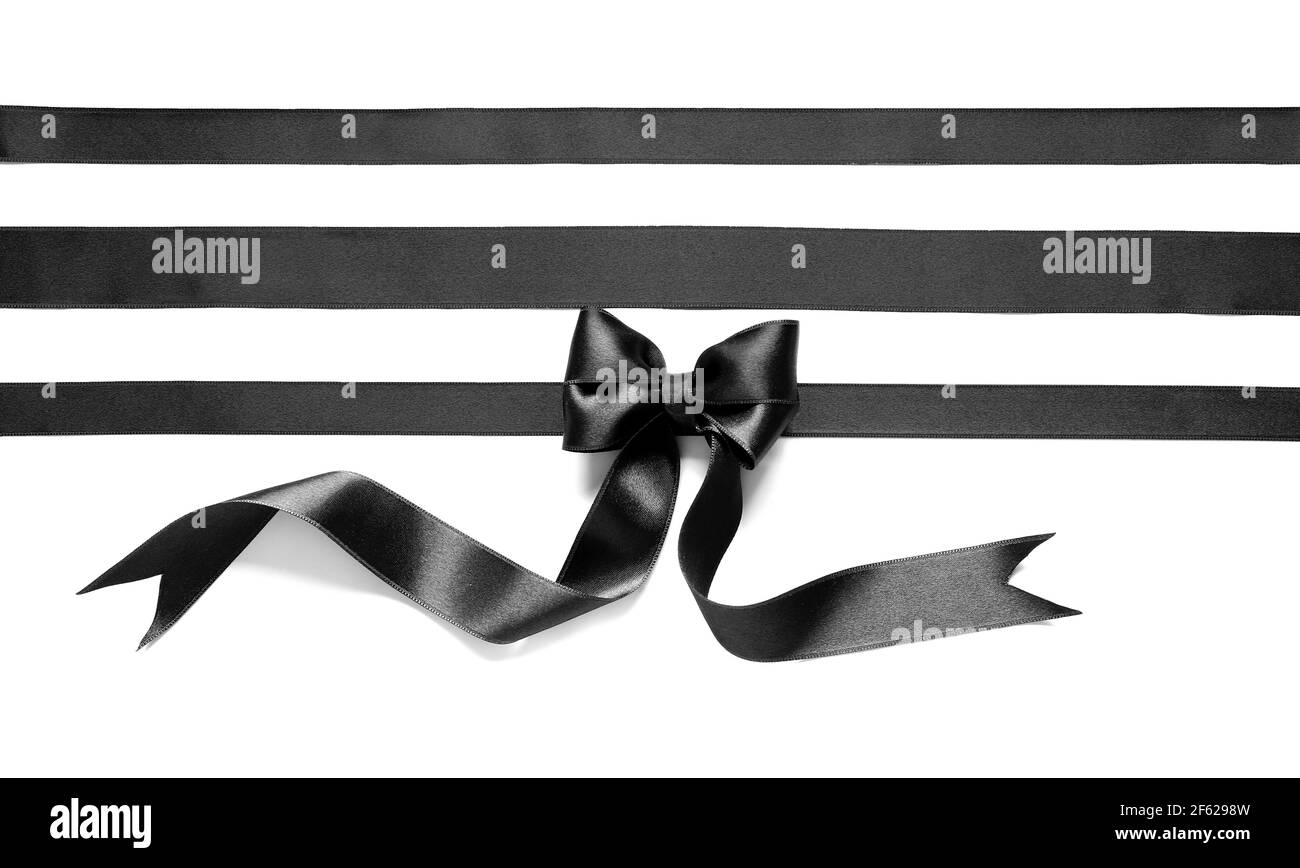 Black ribbons and bow on white background Stock Photo Alamy