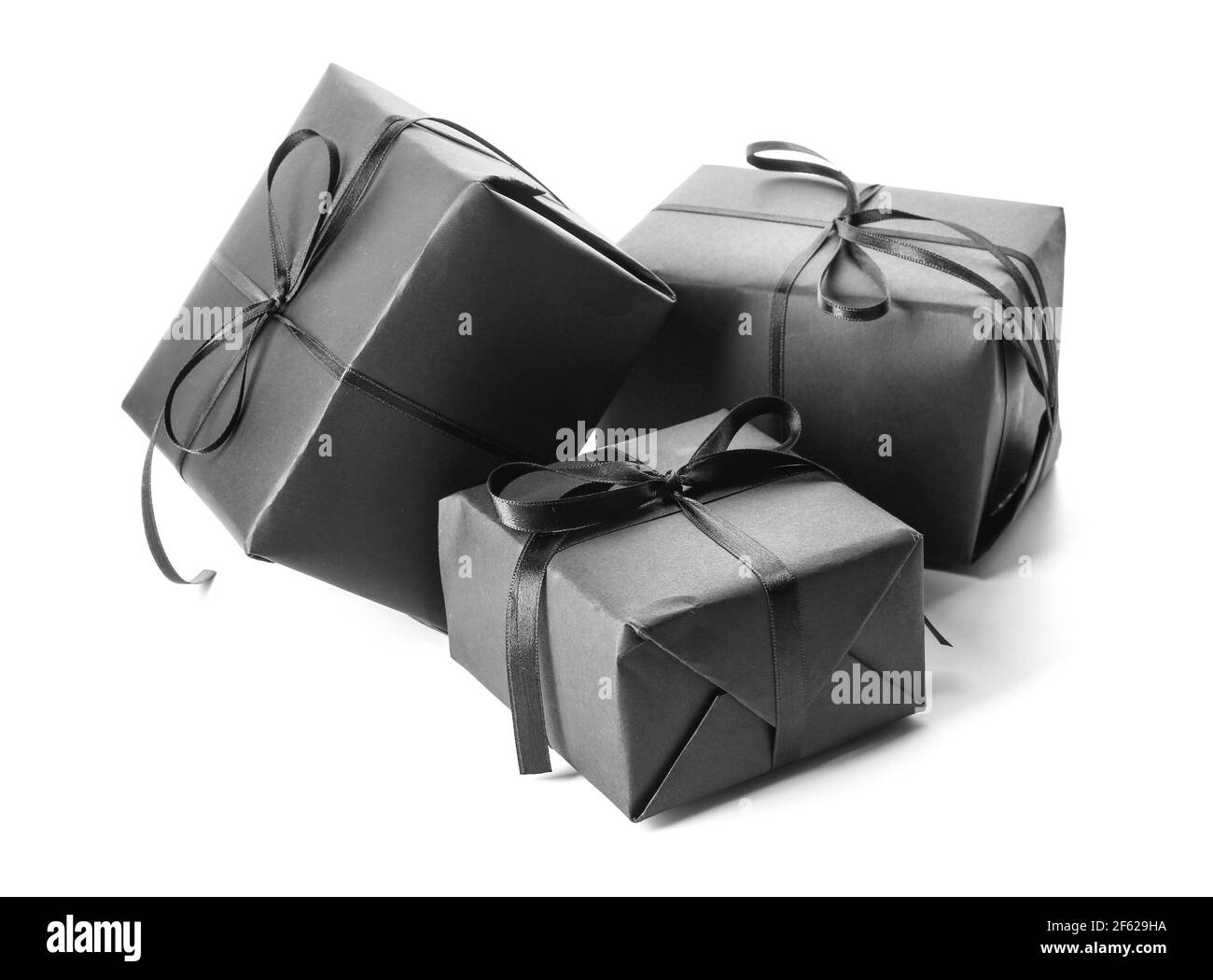 Black gift boxes on white background Stock Photo - Alamy