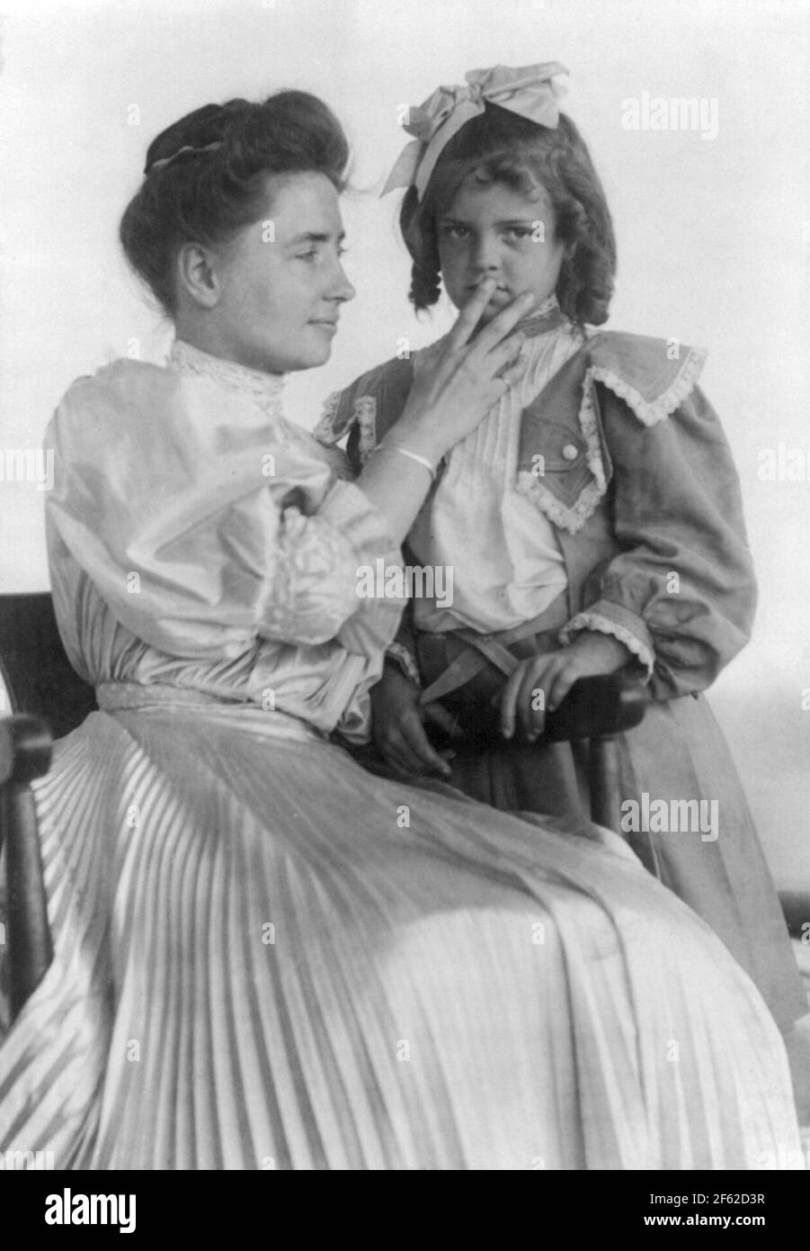 Helen Keller Reading Girl's Lips with Fingers, 1907 Stock Photo