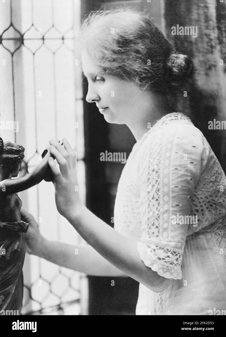 Helen Keller Touching Statue, 1912 Stock Photo