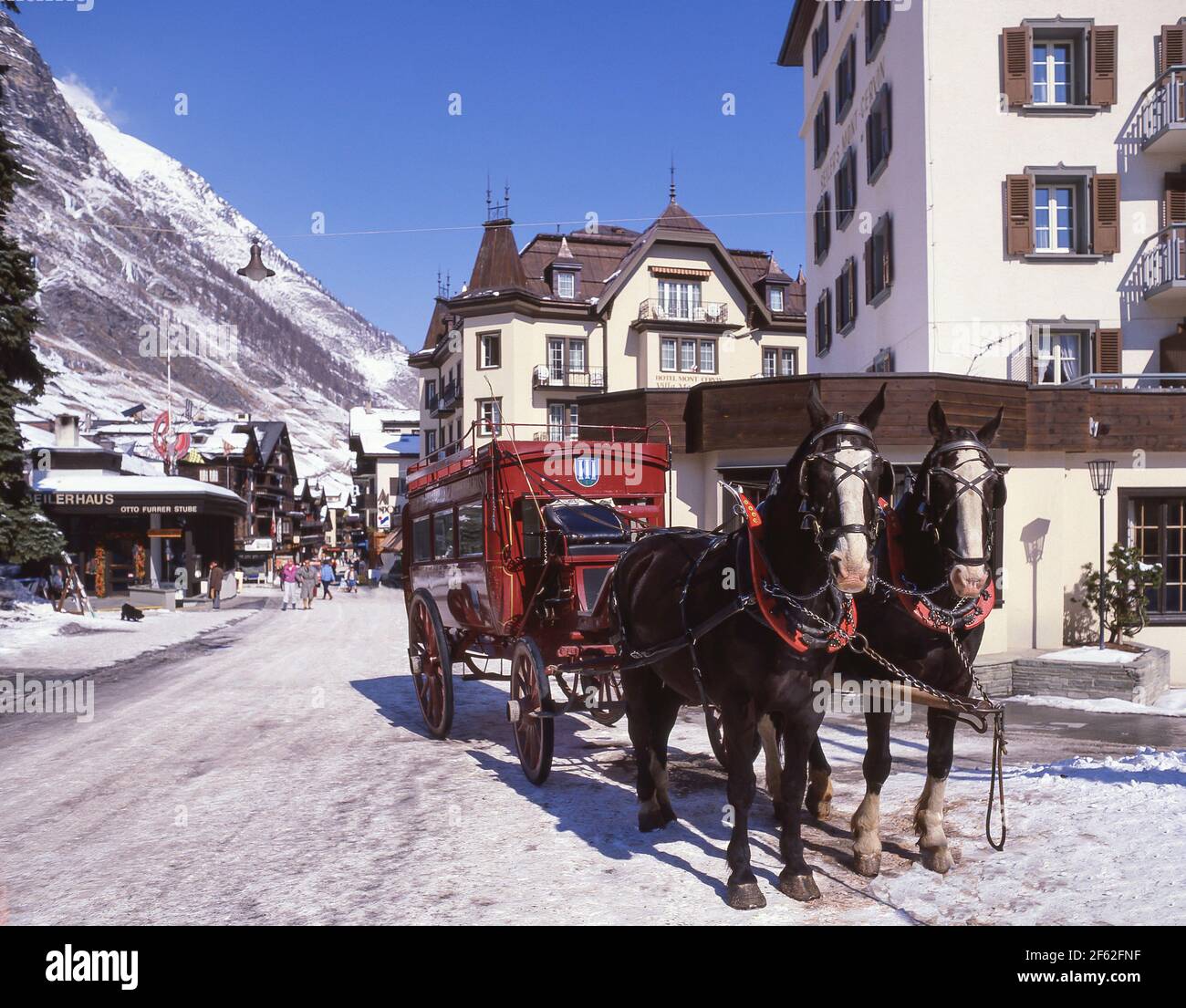 Horse carriage in town centre, Bahnhofstasse, Zermatt, The Valais, Switzerland Stock Photo Alamy