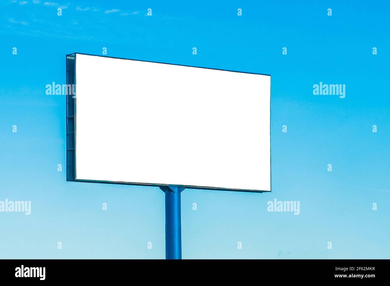 Mock up blank big billboard on blue sky background. Stock Photo