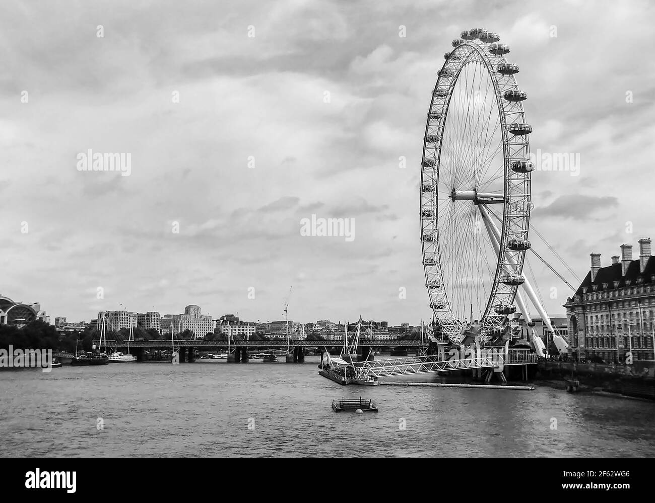 Black and white capture of the London Eye and the Thames river Stock Photo
