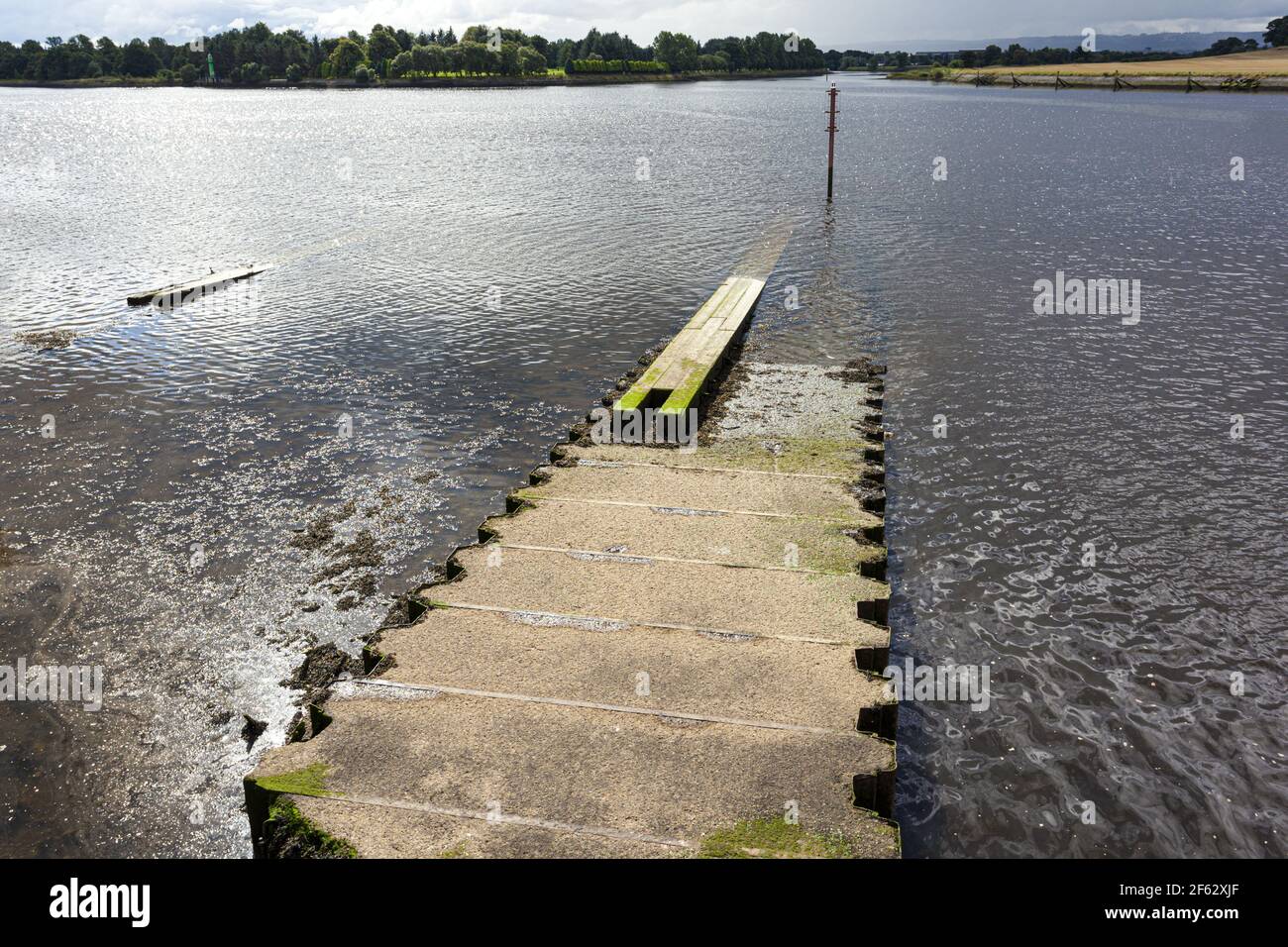 An old slipway on the site of the former John Brown Shipyard on the River Clyde at Clydebank, Glasgow, Scotland UK Stock Photo