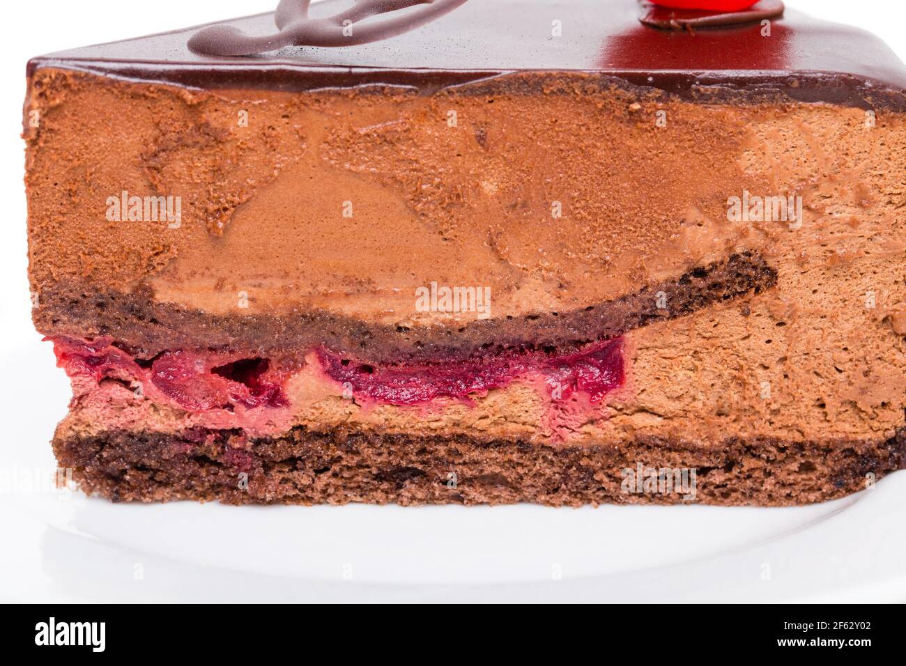 Closeup of delicious chocolate cake with cherry. Macro. Photo can be used as a whole background. Stock Photo