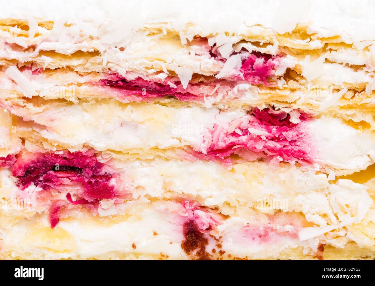 Delicious cake with cherry and coconuts. Macro. Photo can be used as a whole background. Stock Photo