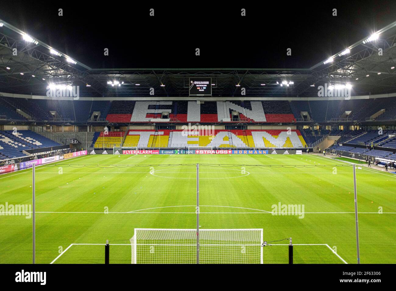 Schauinsland-Reisen-Arena, overview, on the tribune is a choreography in Germany colors and the lettering 'Aû Ein Team' Aû. Soccer Laenderspiel, WM Qualification Group J matchday 1, Germany (GER) - Iceland (ISL) 3: 0, on March 25th, 2021 in Duisburg/Germany. ¬ | usage worldwide Stock Photo