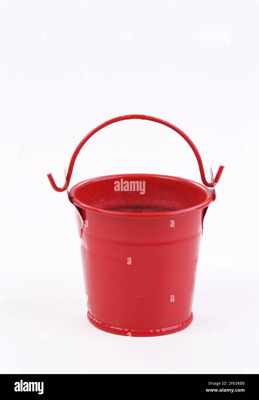 Red metal bucket decorative isolated on white background Stock Photo