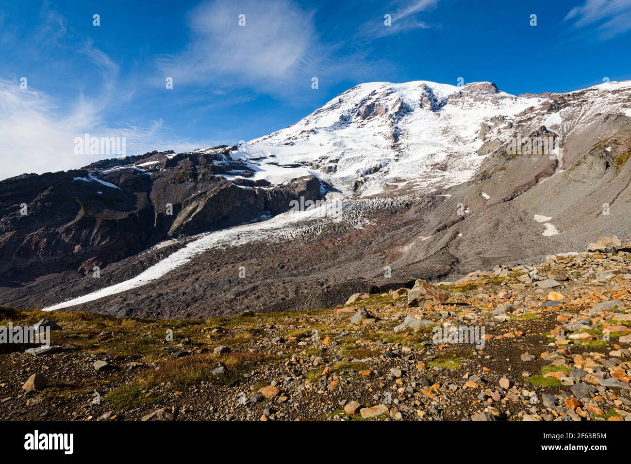Mount Rainier viewed from the Skyline trail in late Fall showing the Nisqually Glacier flowing from the volcanic peak Stock Photo