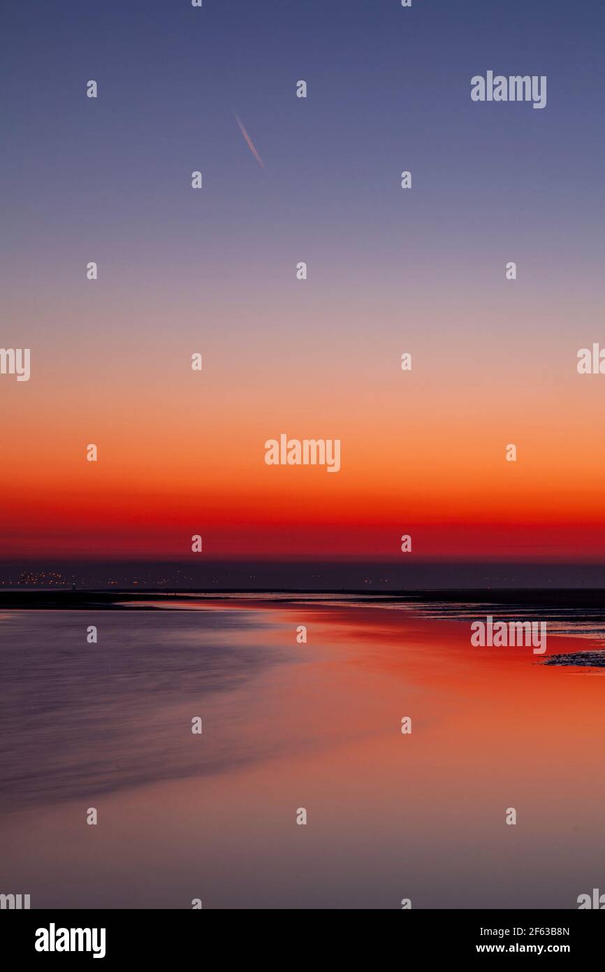 Tidal pools on Talacre beach at dawn, North Wales coast Stock Photo