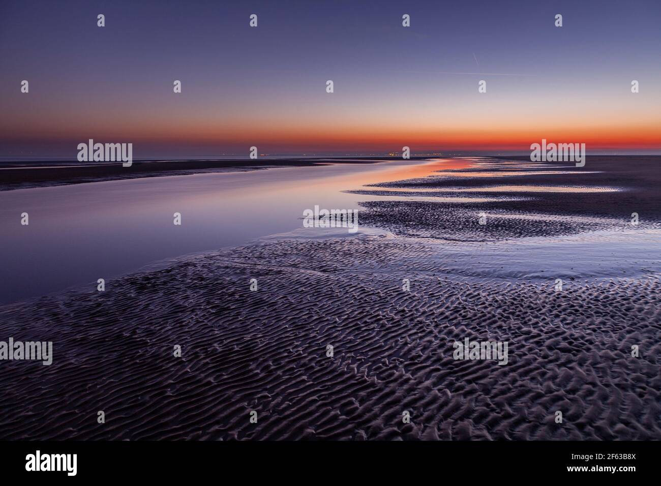 Tidal pools on Talacre beach at dawn, North Wales coast Stock Photo