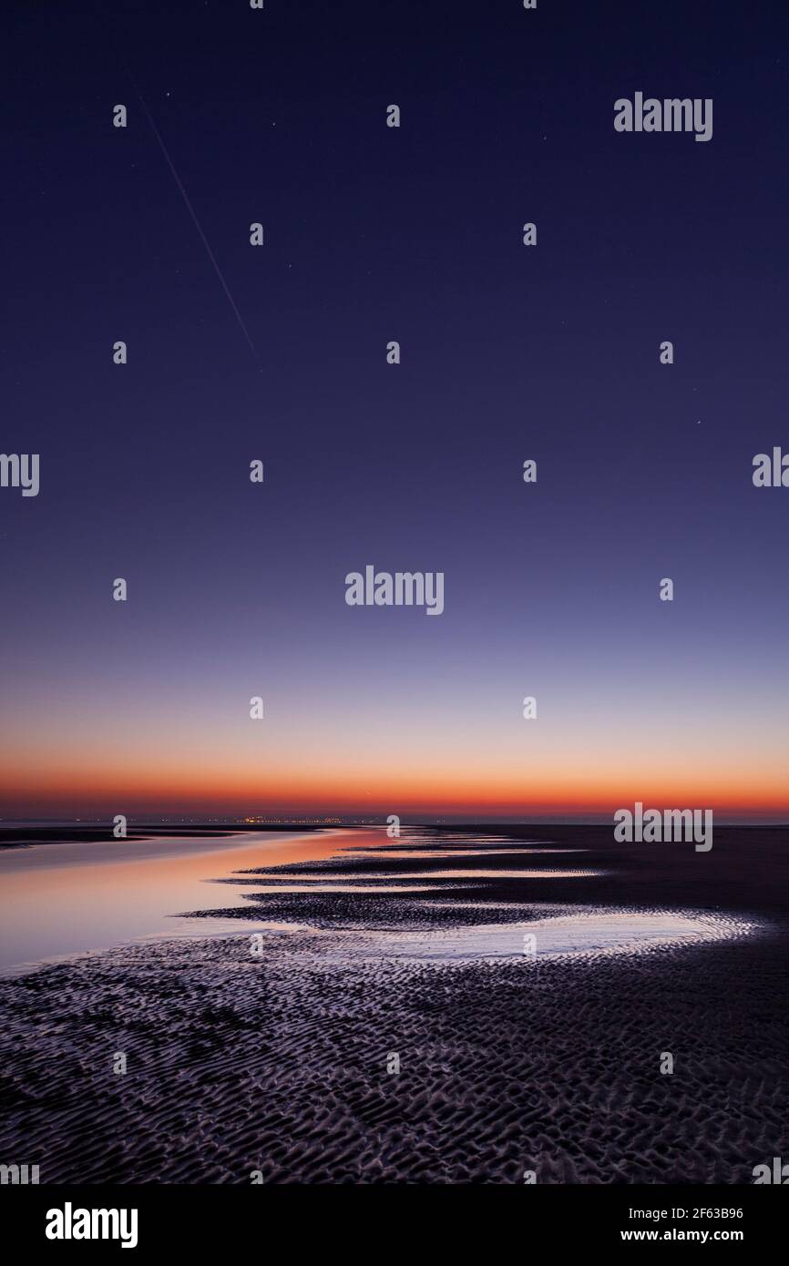 Tidal pools on Talacre beach at dawn, North Wales coast Stock Photo