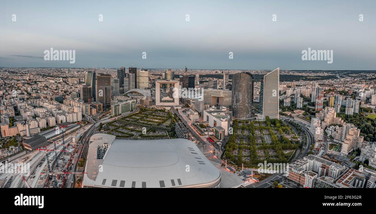 Paris, France - Jun 20, 2020: Panoramic aerial shot of skyscrapers in La Defense post pandemic lockdown at dusk Stock Photo