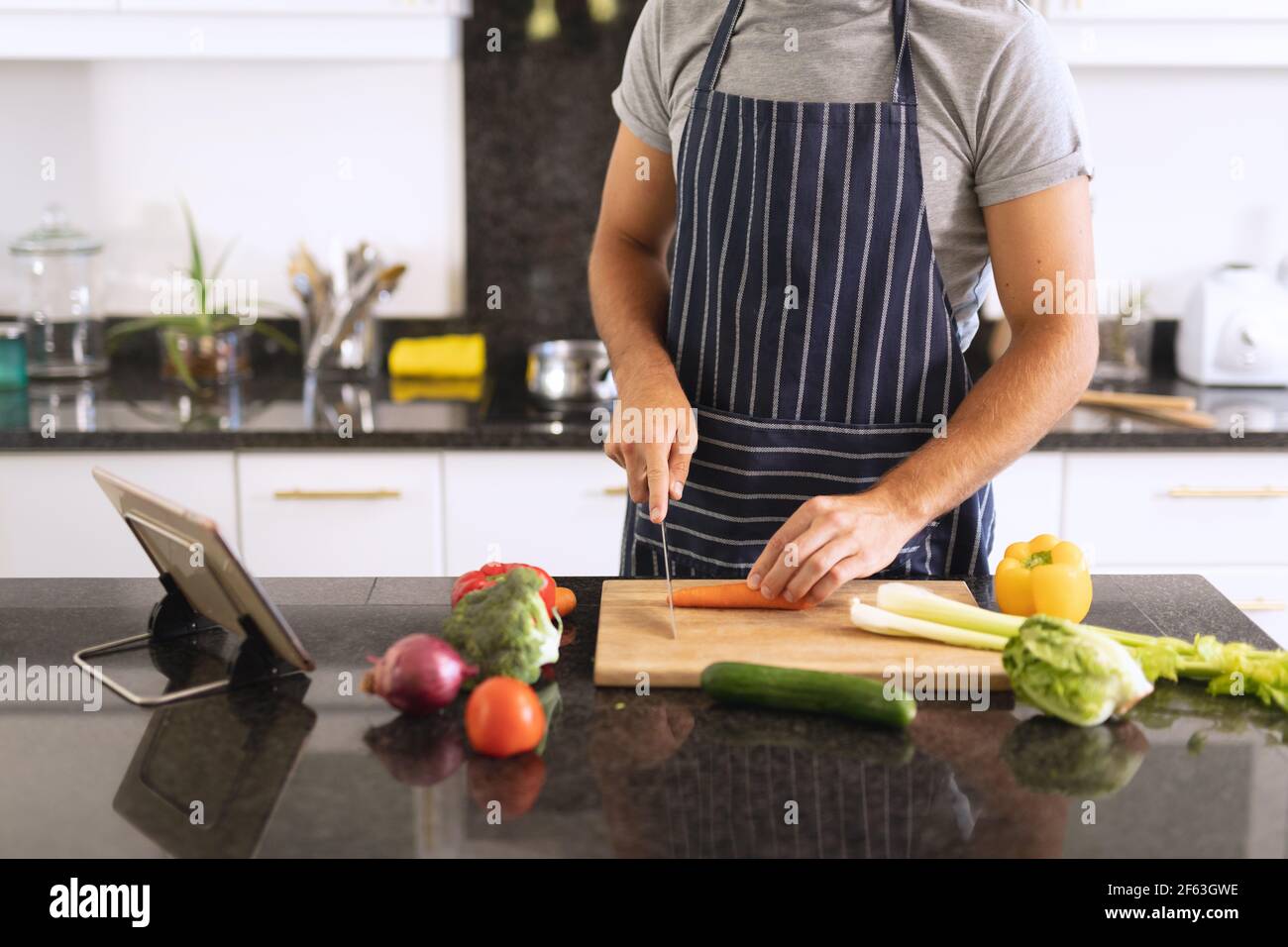 Man Wearing Apron and Cooking Stock Photo - Image of preparing, healthy:  31670526
