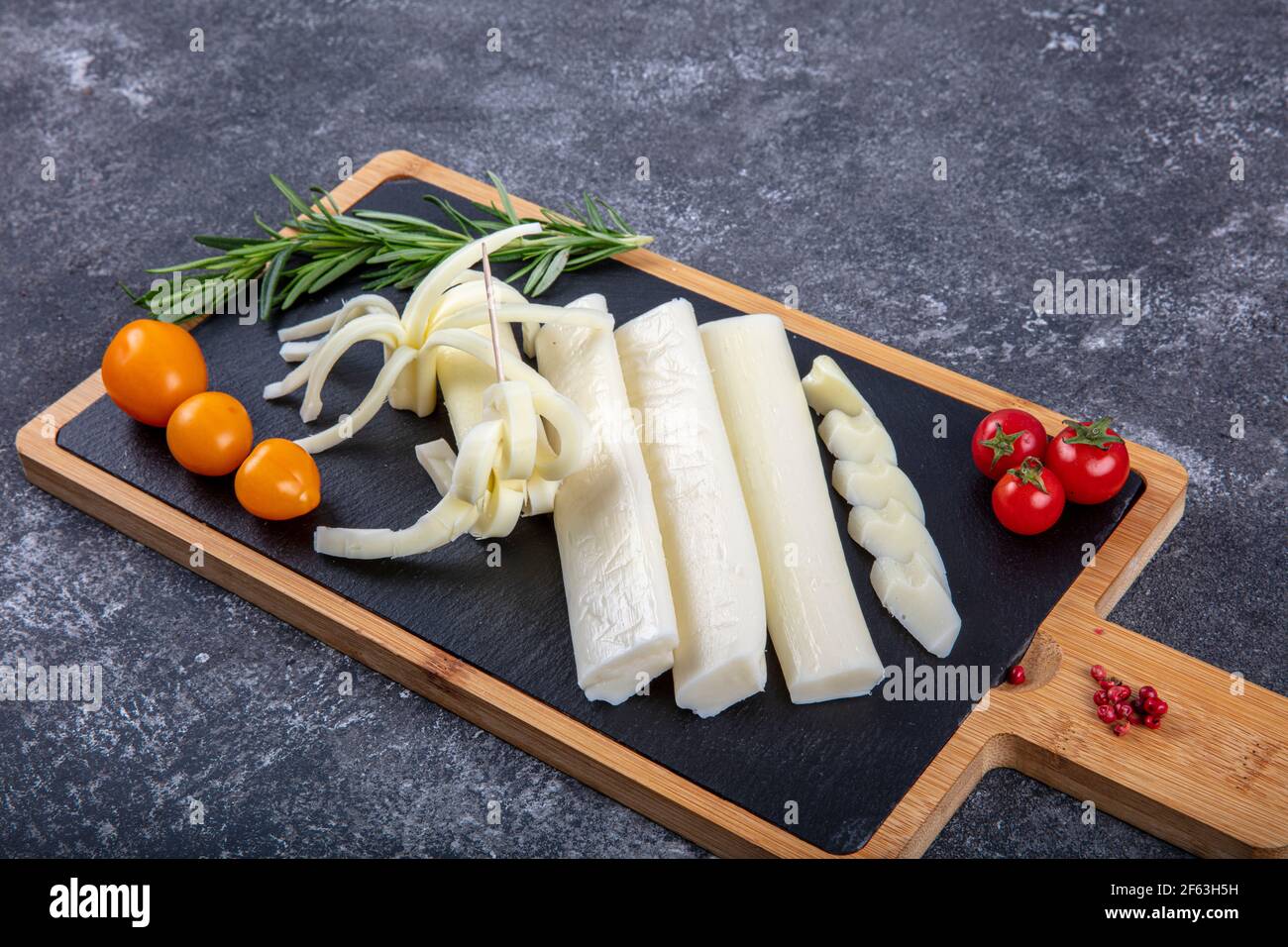 Cecil cheese on wooden background. Angel Hair Cheese, or stringy cheese. Stock Photo