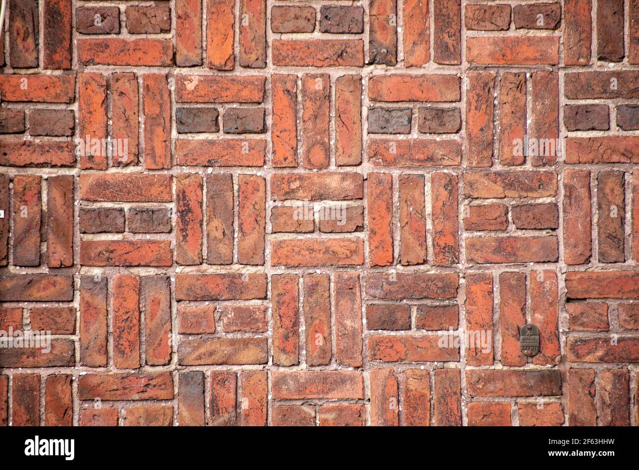 Pattern on a red brick wall in Ullanlinna district of Helsinki, Finland Stock Photo