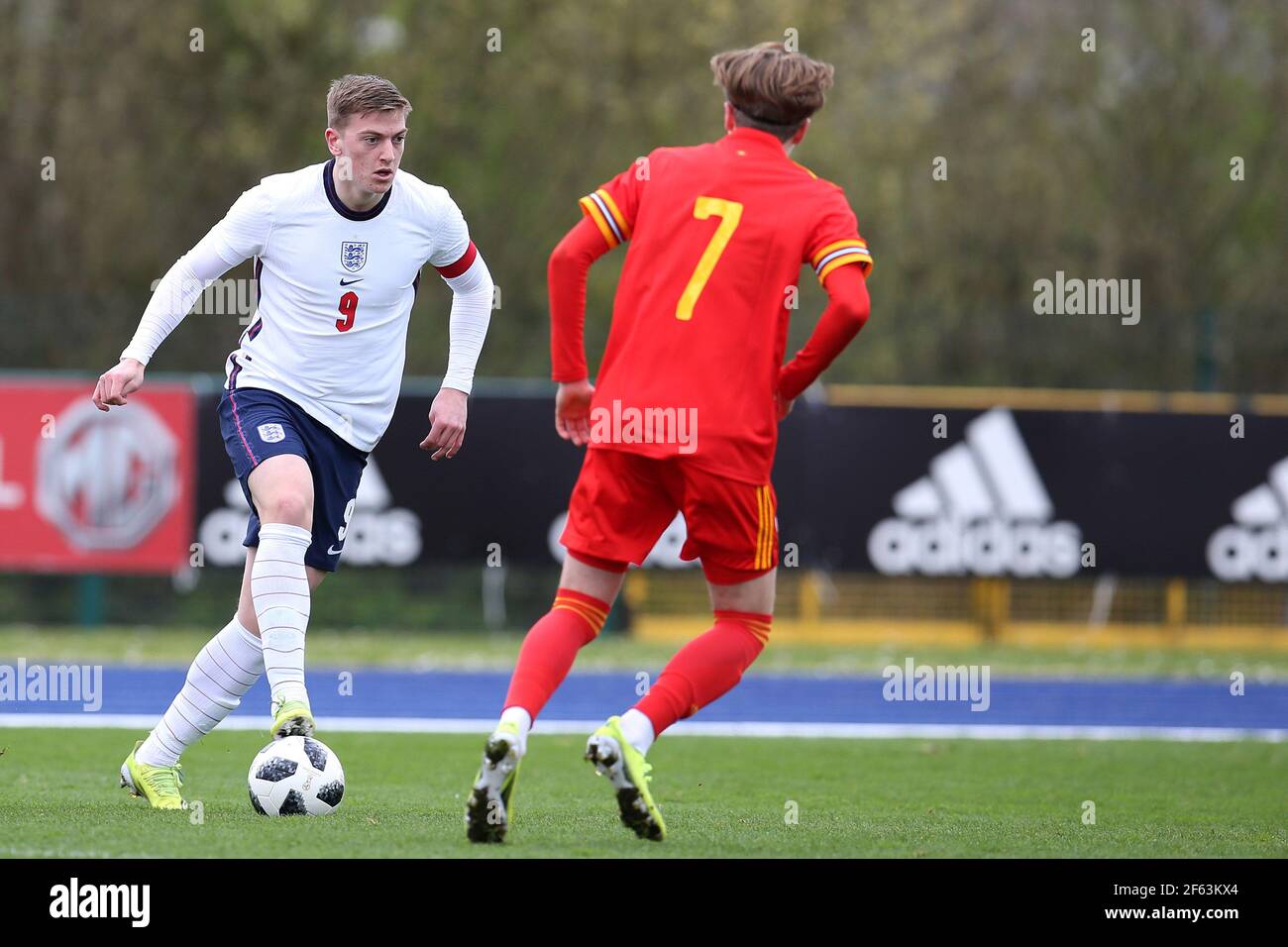 Cardiff, UK. 29th Mar, 2021. Liam Delap of England looks to go past Charlie Savage of Wales. U18 Football international match, Wales v England, at the Leckwith stadium in Cardiff, South Wales on Monday 29th March 2021. Editorial use only. pic by Andrew Orchard/Andrew Orchard sports photography/Alamy Live News Credit: Andrew Orchard sports photography/Alamy Live News Stock Photo