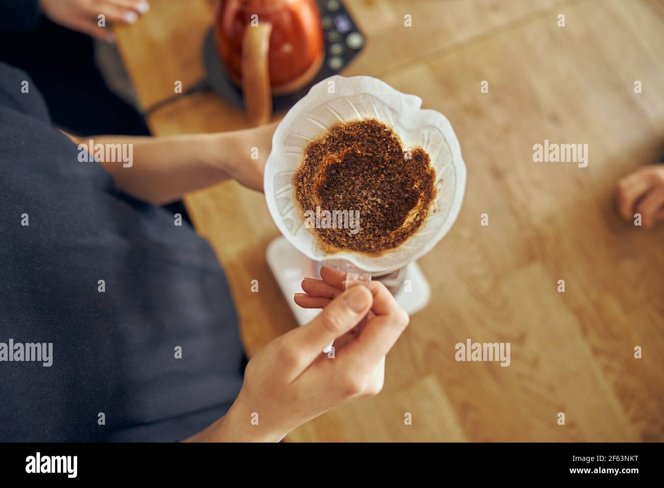 Delicious, freshly ground morning coffee powder in the coffee filter