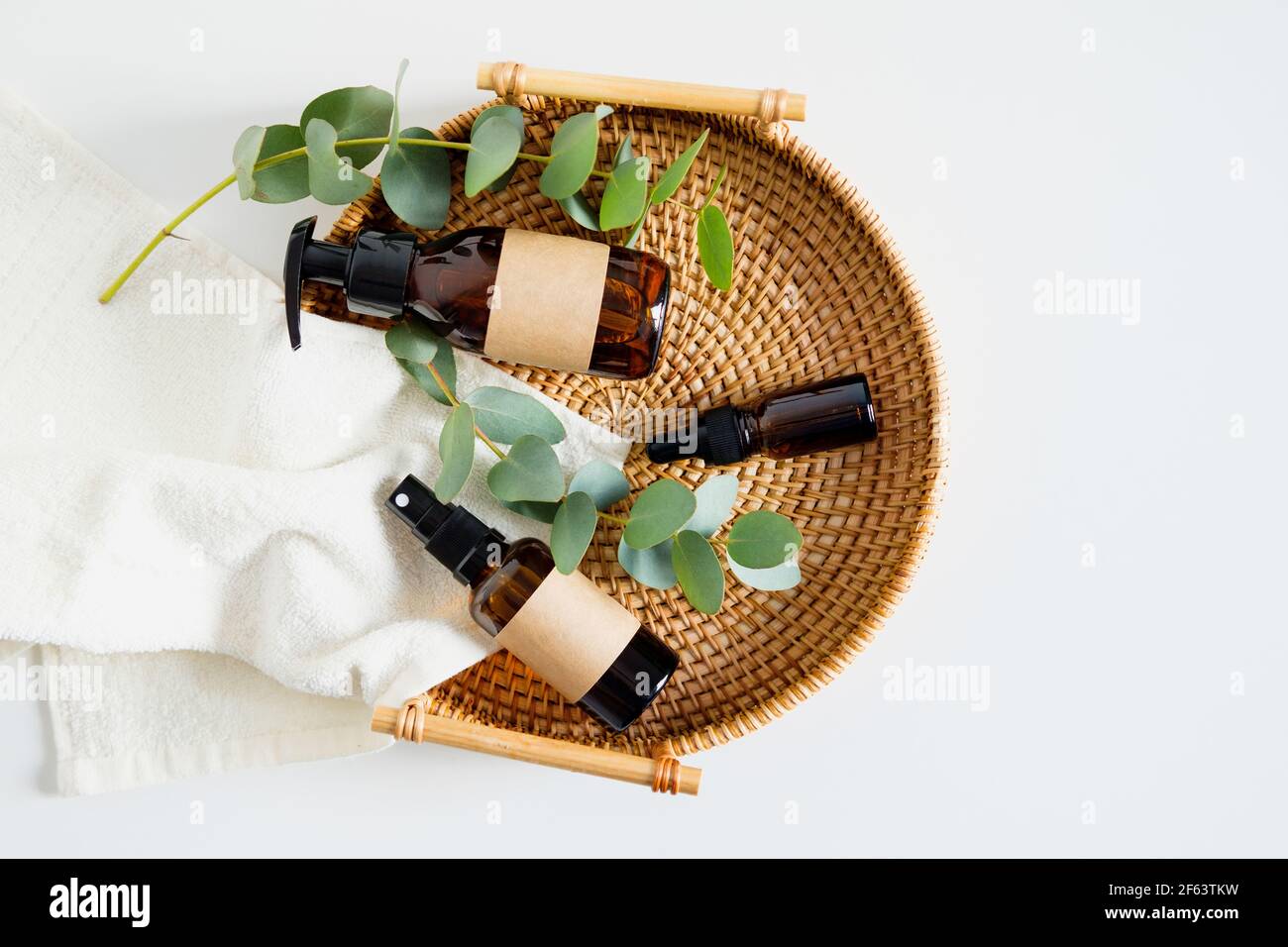 Amber Glass Containers With Natural Cosmetics And Eucalyptus In Wooden Rattan Tray On Table In Bathroom Spa Organic Bio Cosmetics Set Stock Photo Alamy