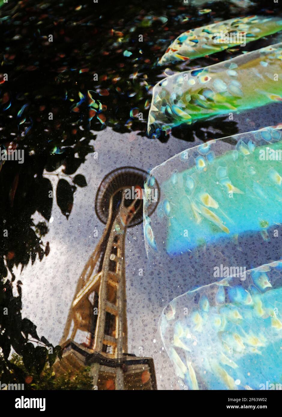 The Space Needle reflected in a Chihuly glass globe. Stock Photo
