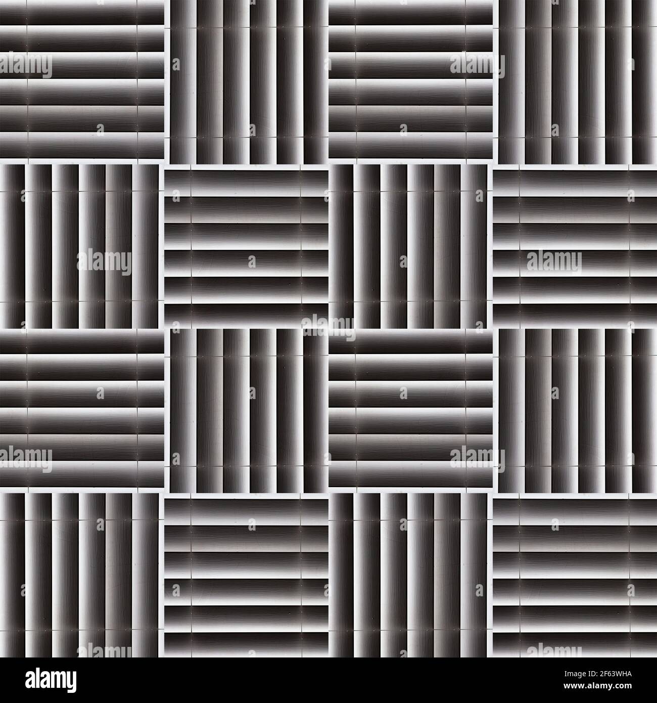 An image of a detail of Venetian blinds is turned into a geometric design, with repetition and composite photography. Stock Photo