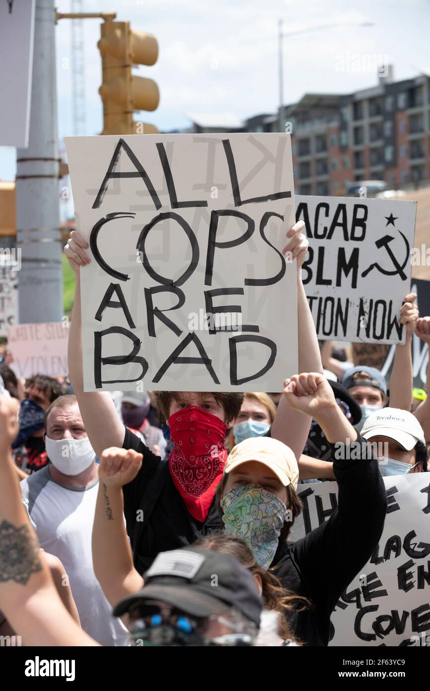 Austin, TX USA May 30, 2020: Thousands rally at police headquarters and block Interstate 35 in Austin, TX in both directions protesting the killing of George Floyd and other lives lost while in police custody. The protest mirrored dozens nationwide as Americans rally against alleged police brutality against Blacks. ©Bob Daemmrich Stock Photo