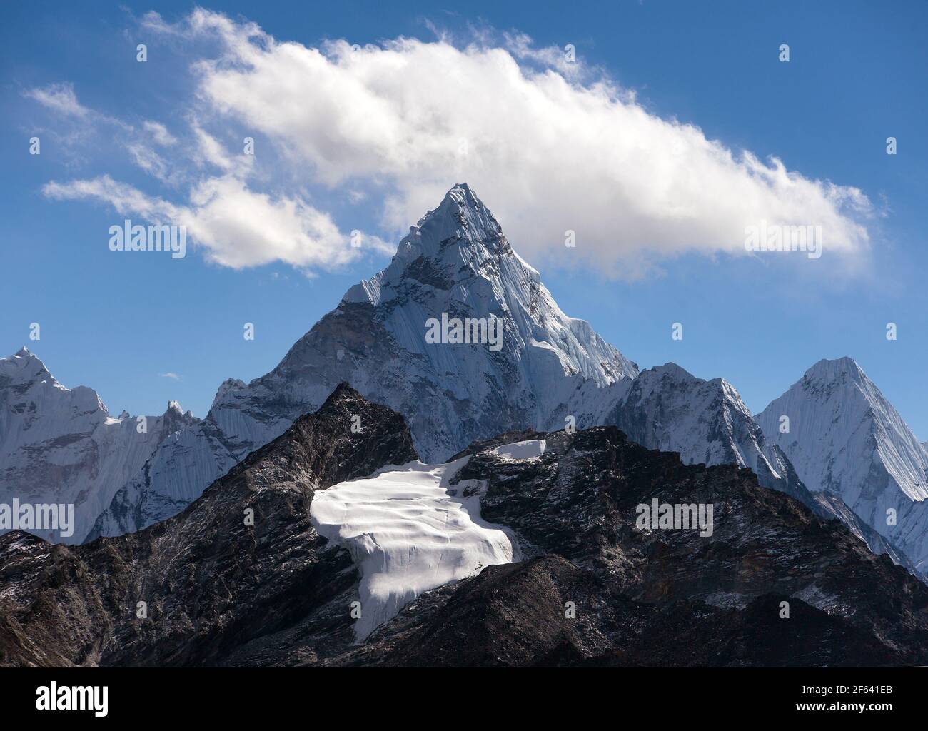 Mount Ama Dablam within clouds, way to Everest base camp, Khumbu valley, Sagarmatha national park, Everest area, nepalese himalayas, Nepal Stock Photo