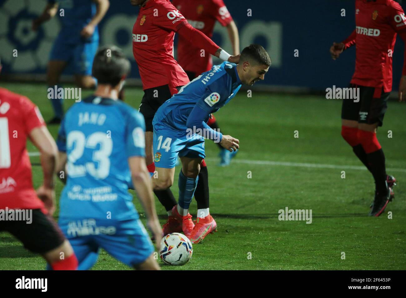 Fuenlabrada, Madrid, Spain, 29.03.2021C. F. Fuenlabrada against R. C. D. Mallorca match of the second division of Spanish soccer in match 31. Fuenlabrada player Oscar Pichi get foul and penalty Final score 4-1 winner Fuenlabrada with goals from the players Oscar Pichi 13 y 38  Nteka 41  and Pathe Ciss 73  Mallorca scores his player Mboula 56  Photo: Juan Carlos Rojas/Picture Alliance | usage worldwide Stock Photo