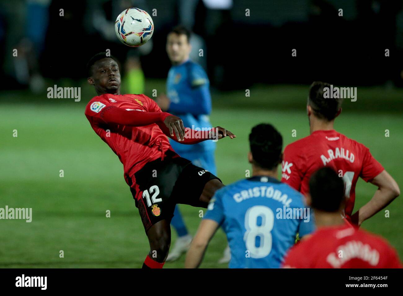 Fuenlabrada, Madrid, Spain, 29.03.2021C. F. Fuenlabrada against R. C. D. Mallorca match of the second division of Spanish soccer in match 31. Mallorca player Baba heads off Final score 4-1 winner Fuenlabrada with goals from the players Oscar Pichi 13 y 38  Nteka 41  and Pathe Ciss 73  Mallorca scores his player Mboula 56  Photo: Juan Carlos Rojas/Picture Alliance | usage worldwide Stock Photo
