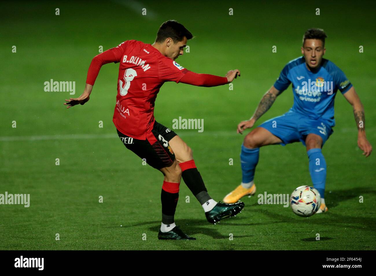 Fuenlabrada, Madrid, Spain, 29.03.2021C. F. Fuenlabrada against R. C. D. Mallorca match of the second division of Spanish soccer in match 31. Mallorca player Brian Olivan (L) Final score 4-1 winner Fuenlabrada with goals from the players Oscar Pichi 13 y 38  Nteka 41  and Pathe Ciss 73  Mallorca scores his player Mboula 56  Photo: Juan Carlos Rojas/Picture Alliance | usage worldwide Stock Photo