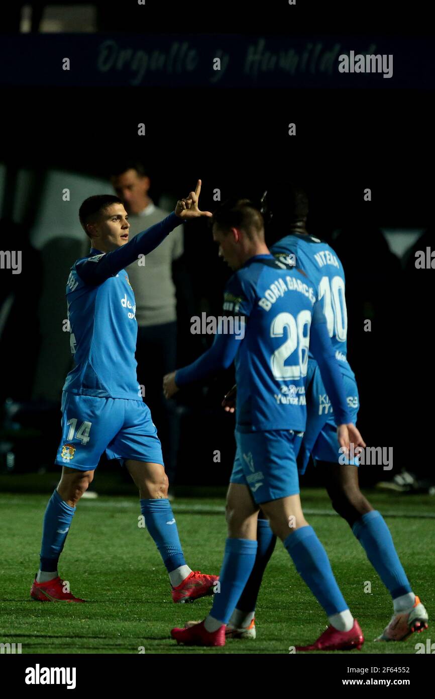 Fuenlabrada, Madrid, Spain, 29.03.2021C. F. Fuenlabrada against R. C. D. Mallorca match of the second division of Spanish soccer in match 31. Fuenlabrada player Oscar Pichi celebrate your goal Final score 4-1 winner Fuenlabrada with goals from the players Oscar Pichi 13 y 38  Nteka 41  and Pathe Ciss 73  Mallorca scores his player Mboula 56  Photo: Juan Carlos Rojas/Picture Alliance | usage worldwide Stock Photo