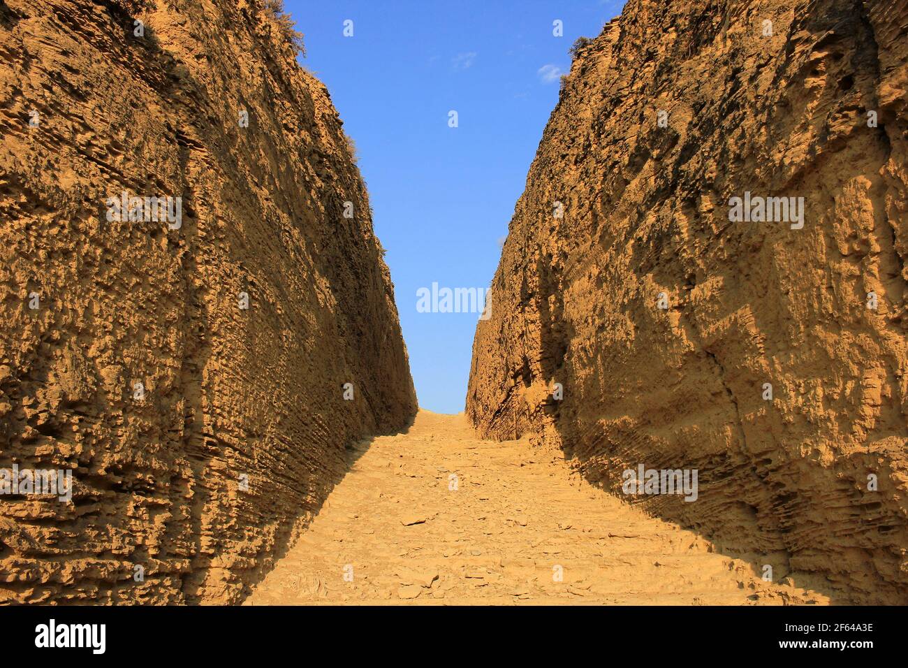 Path Between The Rocks The path between the rocks to the caves. Ancient dwellings. Azerbaijan ...