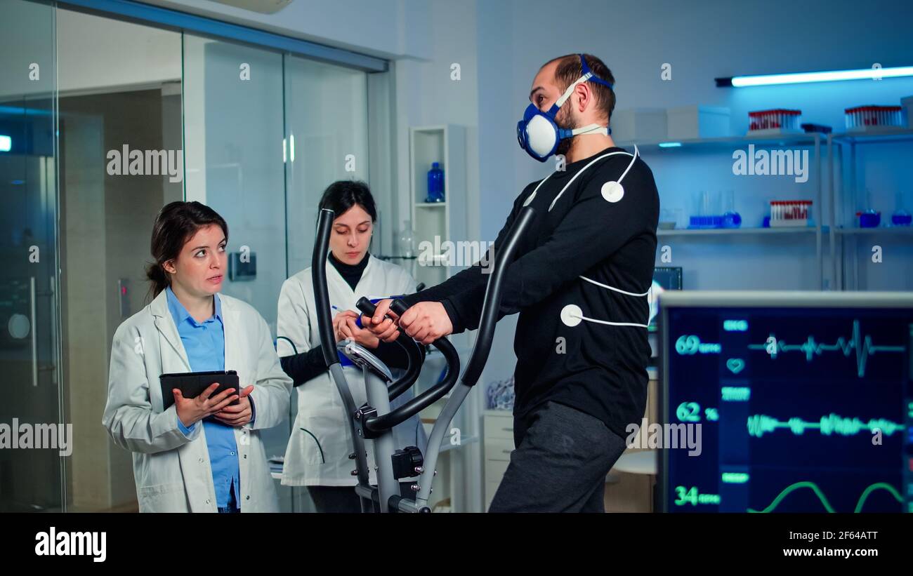 Team sports performance monitoring hires stock photography and images