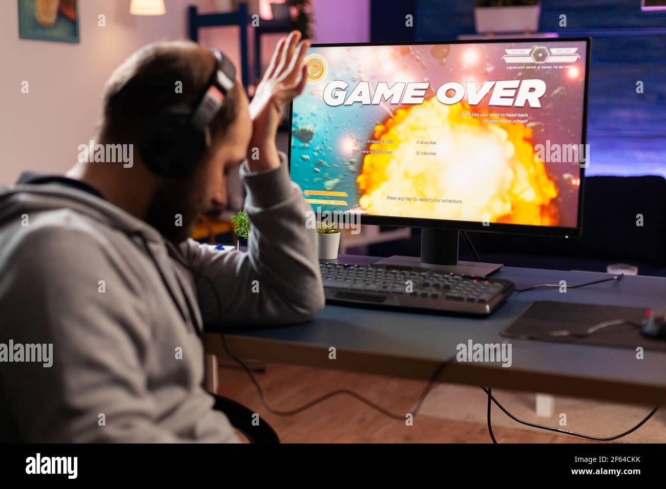 Professional gamer using joystick during hi-res stock photography and ...