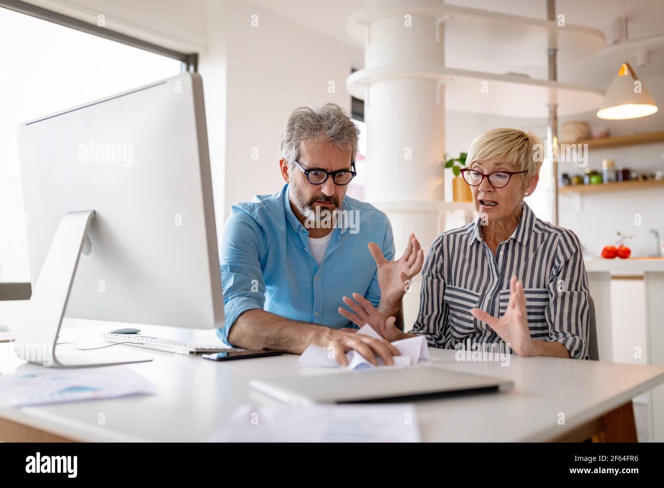 Overworked senior business people have stress, exhaustion in office Stock Photo