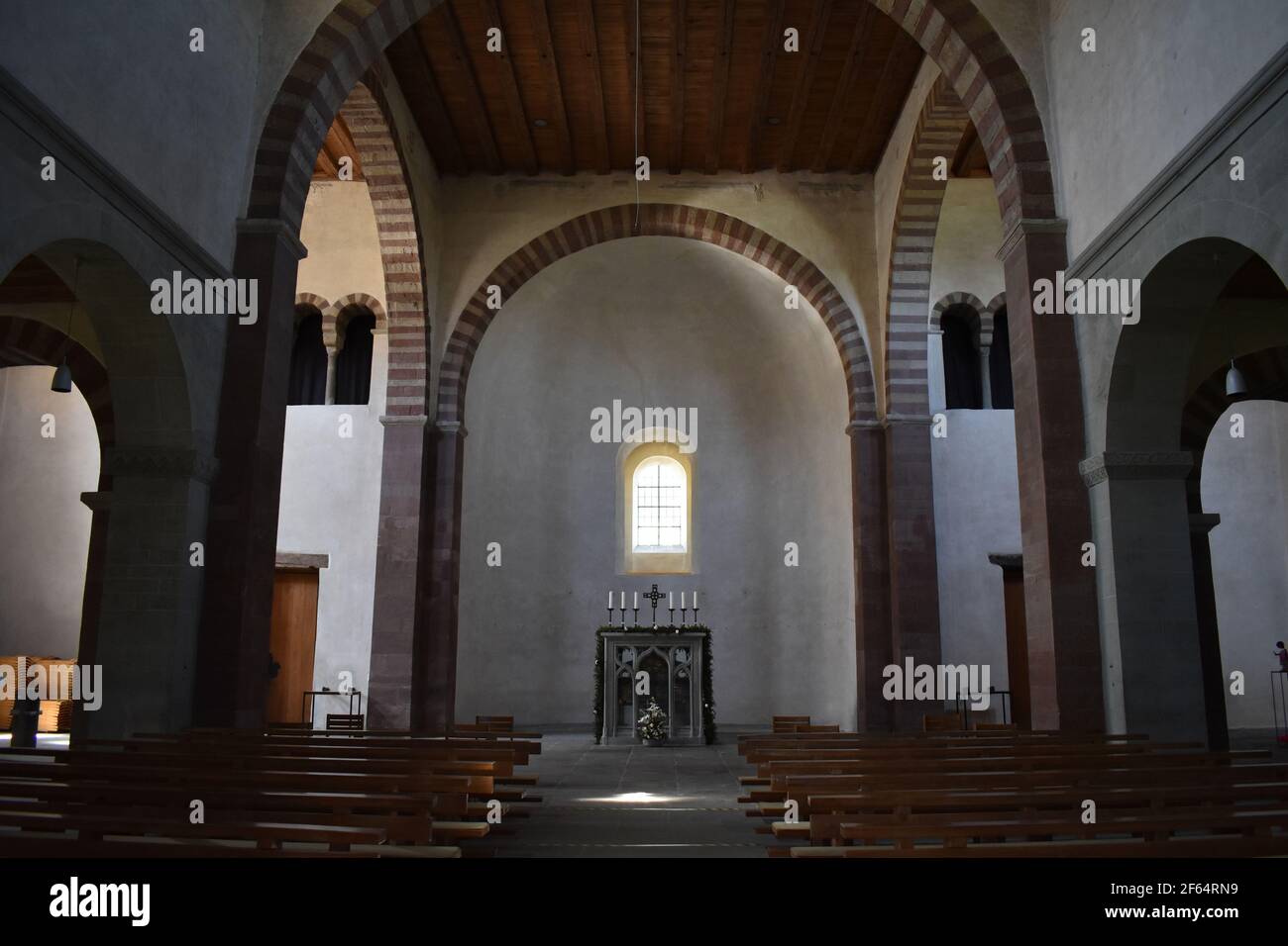 The Abbey Church of St Mary and Mark in Reichenau Mittelzel. View from the nave of the west transept and the altar of St Mark in front of the apse. Stock Photo