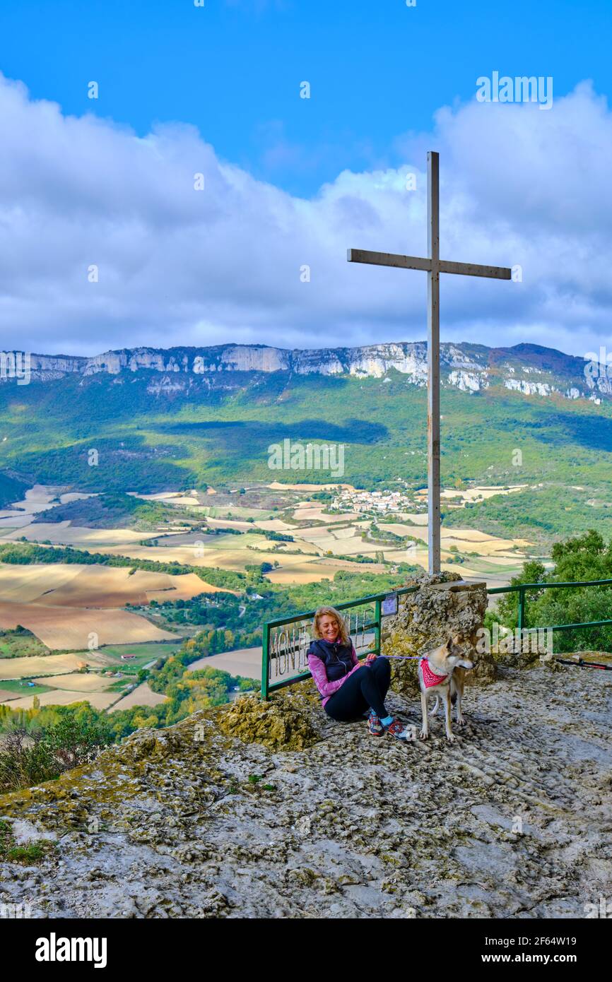 Young mature hiker woman with a dog in a viewpoint Stock Photo - Alamy