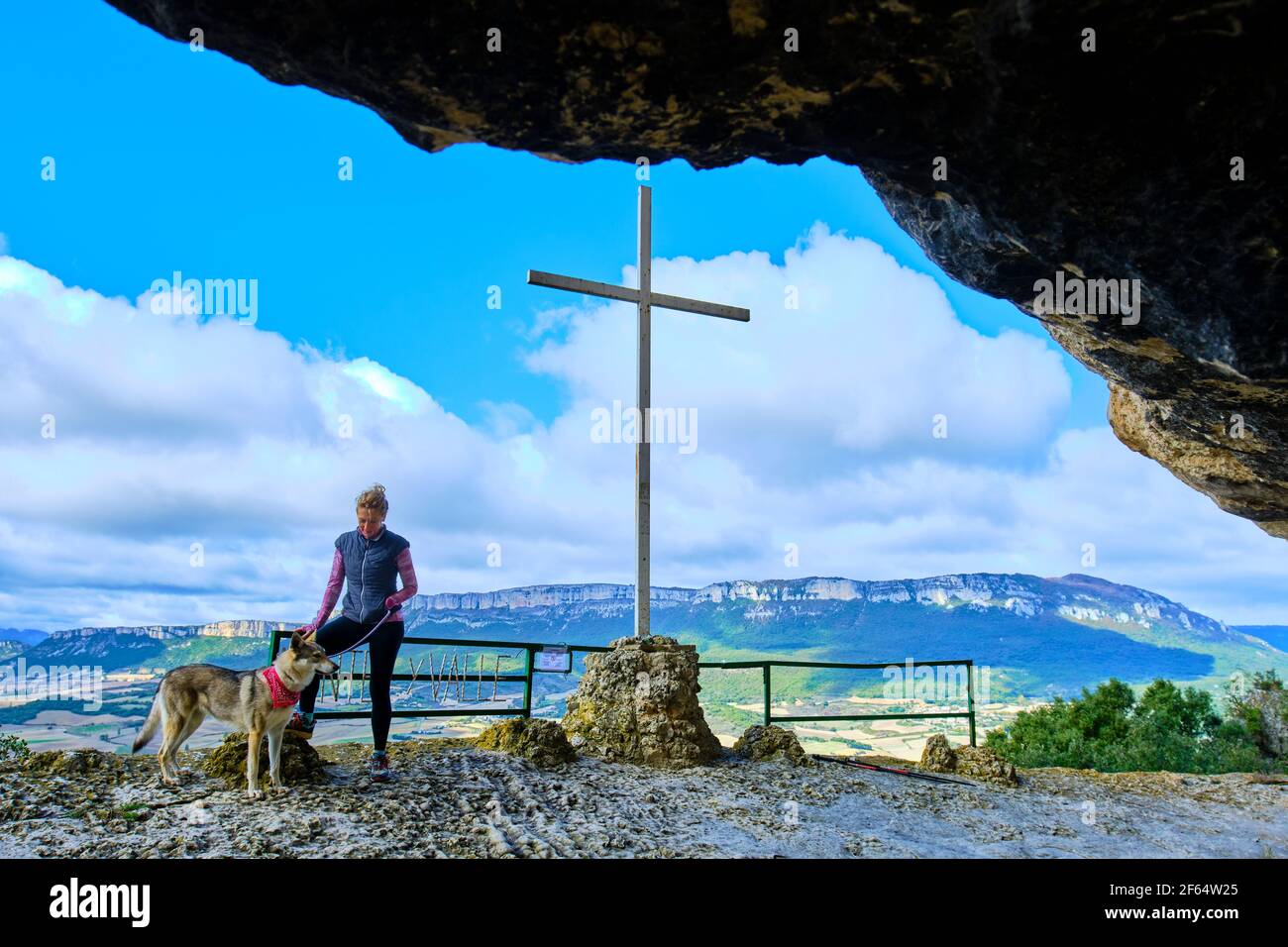 Young mature hiker woman with a dog in a viewpoint Stock Photo - Alamy