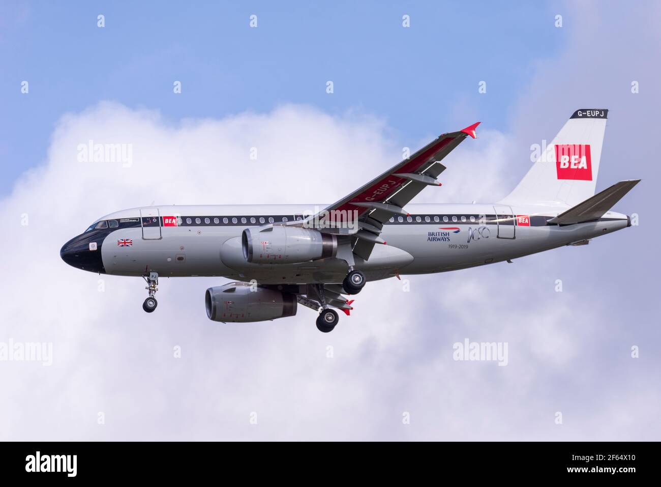 BEA retro British Airways Airbus A319 jet airliner plane G-EUPJ on finals to land at London Heathrow Airport, UK. BA Centenary special paint scheme Stock Photo