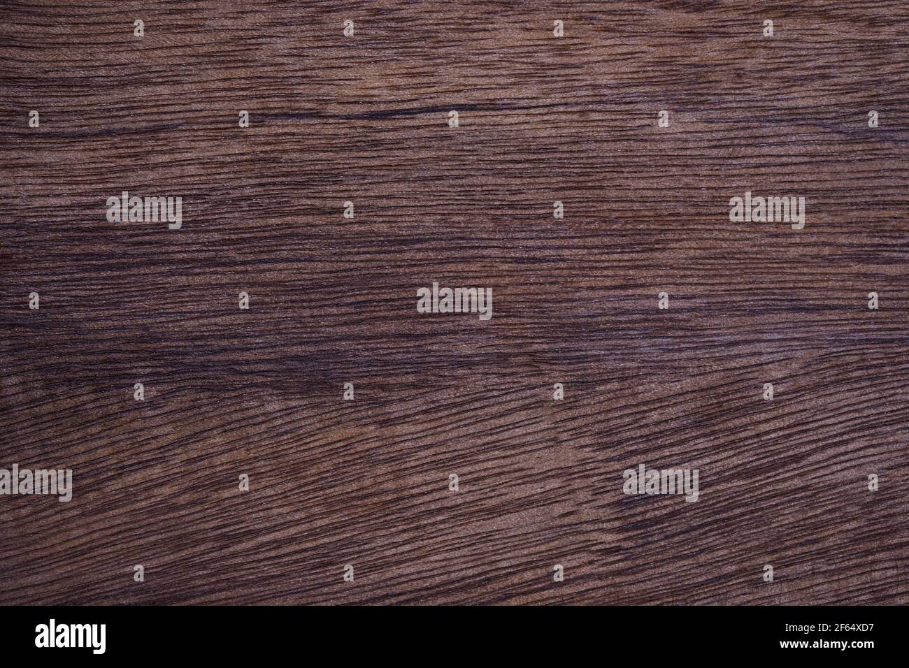 Dark scratched wood texture to made backgrounds for your designs to be good and beautiful. Natural materials with unique patterns and versatility. Hig Stock Photo