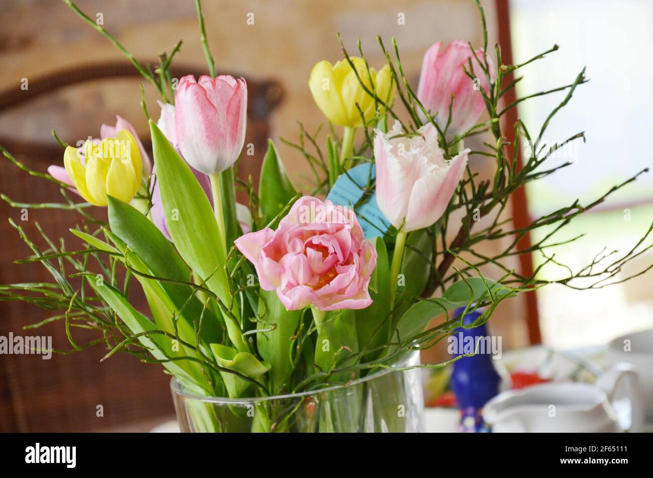 tulips in a vase, festive table, Easter Stock Photo